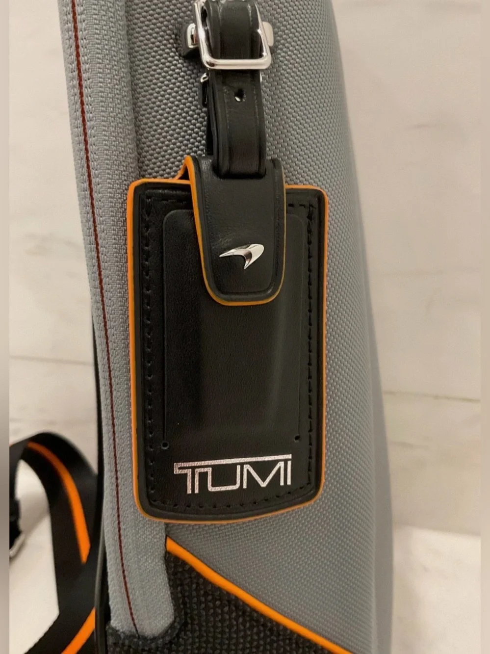 NEW Tumi McLaren TORQUE 14” Sling Crossbody Bag - SUPER GREY with PAPAYA ORANGE